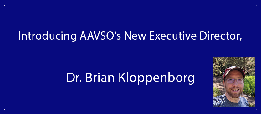 Text reads, Introducing AAVSO's New Executive Director, Dr. Brian Kloppenborg. Photo of a man wearing a baseball hat on a trail with woods behind him